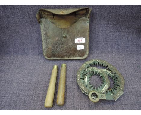 A World War I folding chainsaw in original leather case