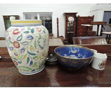 A Poole pottery vase having flower decoration on cream ground, a Carltonware bowl having chinoiserie decoration and two Georg