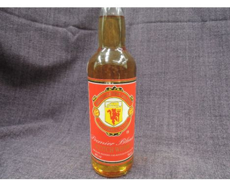 A bottle of Manchester United Football Club Scotch Whisky