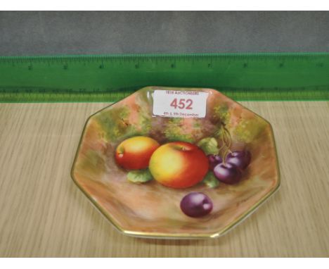 A Royal Worcester octagonal dish having gilt heightened fruit decoration, signed E Townsend
