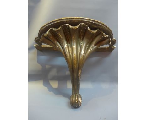 A pair of small 19th Century scallop console tables with original marble tops.