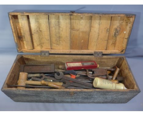 A collection of vintage tools in a painted pine box