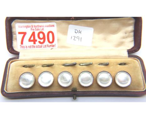 Boxed set of six mother of pearl studs, each bound in  gold plate and brass. P&amp;P Group 1 (£14+VAT for the first lot and £