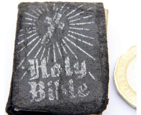 Antique 1 inch New Testament published by Bourne of Harlesden. Undated with paper outer cover, in fair, expected conditions. 