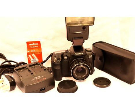 Canon EOS D60 digital SLR camera body with Canon battery, Canon CA-PS400 dual battery charger, Canon neck strap &amp; Carl Ze