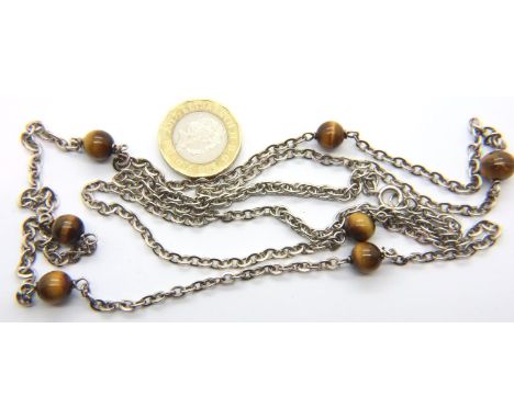 Opera length (80 cm) hallmarked silver necklace with tigers eye beads, 24g. P&amp;P Group 1 (£14+VAT for the first lot and £1