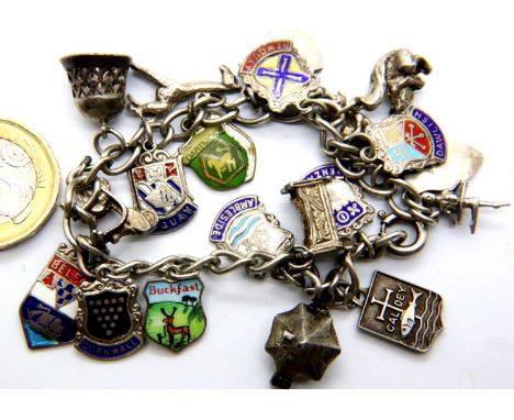 Sterling silver charm bracelet with English place name charms, 36g. P&amp;P Group 1 (£14+VAT for the first lot and £1+VAT for