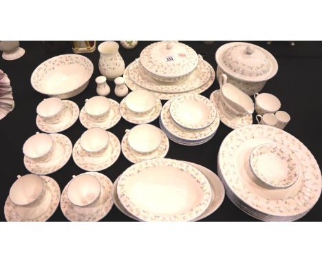 Royal Worcester extensive tea and dinner service in the Forget Me Not pattern of 48 pieces. This lot does not fall into our P