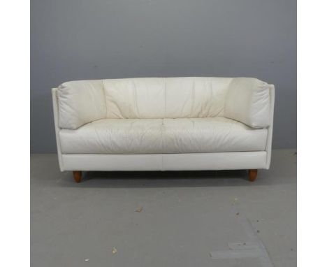 LIGNE ROSET - A contemporary white leather upholstered two-seater sofa. Overall width 145cm, height 71cm, depth 78cm.Good ove