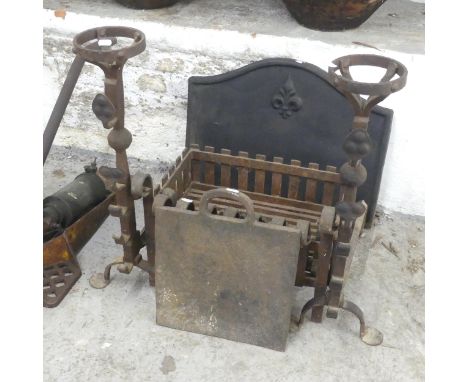 A cast iron fire back, width 58cm, height 44cm, a ducks nest fire grate, a pair of fire dogs etc.