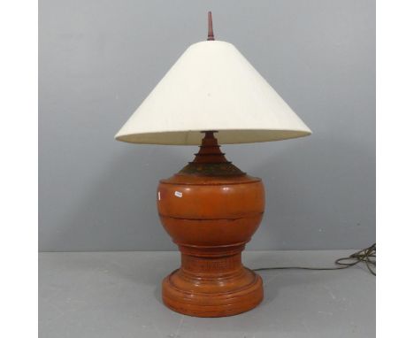 A Burmese lacquered lamp with shade. Overall height 91cm.