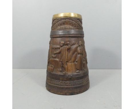 A French coopered oak stick stand with carved decoration. Diameter (base) 33cm, height 56cm.