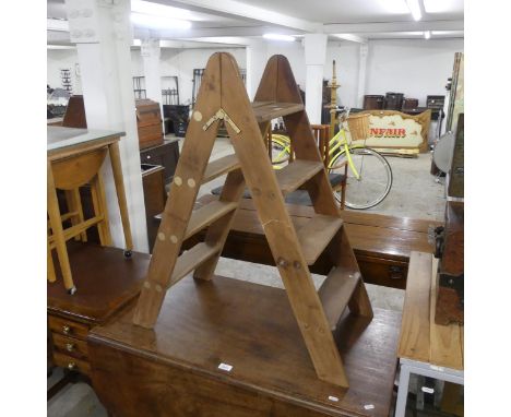 A vintage pine folding step ladder. Height (when erect) 89cm.