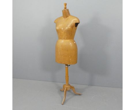 A vintage French shop display mannequin on adjustable teak stand, both marked Cléo. Height as pictured 158cm.
