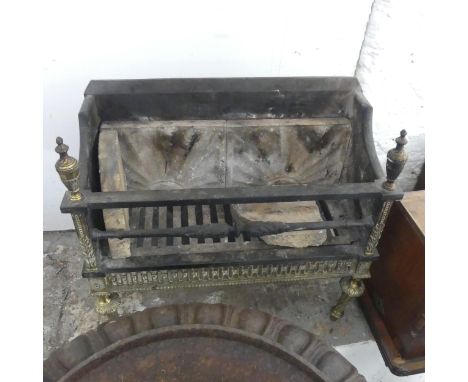 A painted rectangular cast iron fire grate with brass mounts. Width 50cm, height 50cm, depth 22cm.