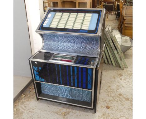 ROCKOLA - A model 449 jukebox. Width 82cm, height 121cm, depth 69cm. Not currently in working order.We have plugged this in a