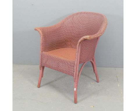 A vintage Lloyd Loom bedroom chair.