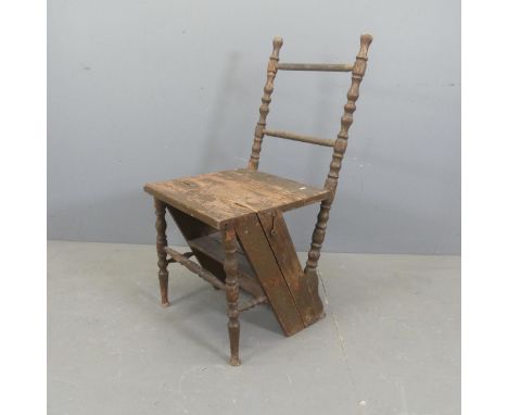 An antique pine fold-over library step chair with bobbin-turned supports. Height as ladder 98cm.