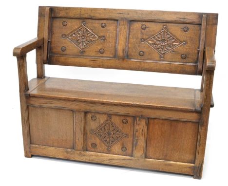 Early 20th century oak monks bench Early 20th century oak monks bench, rectangular hinged top with floral gothic carving to t