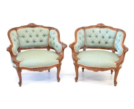 Pair of Victorian button back tub chairs Pair of Victorian tub chairs, walnut framed with a moulded and carved top rail over 