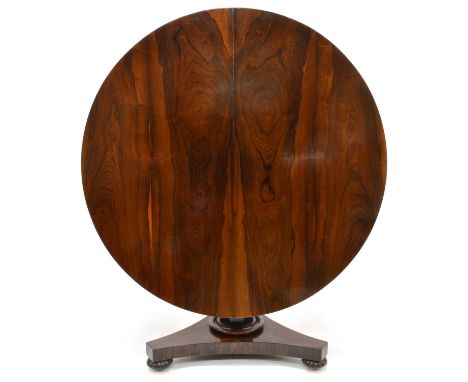 William IV rosewood tilt-top breakfast table William IV rosewood tilt-top breakfast table, circular top raised on an octagona