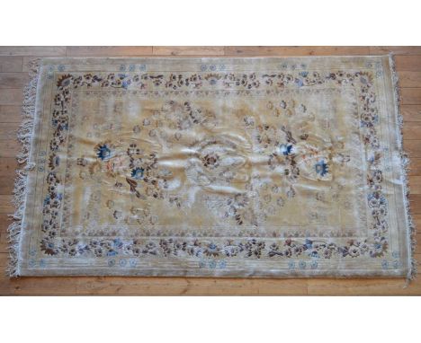 Chinese silk rug Chinese silk rug, cream field with floral decoration throughout245cm x 150cmThe rug is in ok condition. It i