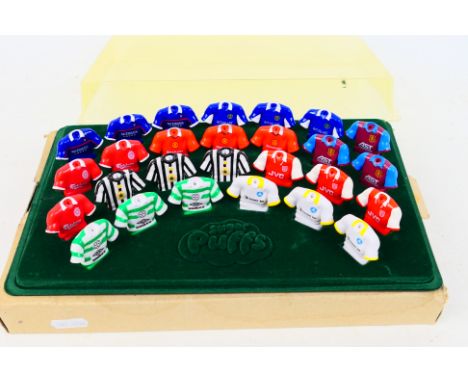 A set of vintage Sugar Puffs football pencil toppers, 27 in total, with display stand and cover. [W]