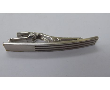 A DuPont white metal tie clip with fluted ornament      11