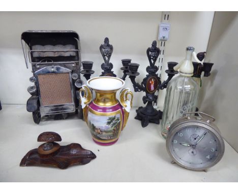 A mixed lot: to include a pair of 'antique' inspired cast metal twin branch candlestick  10''h      TO9