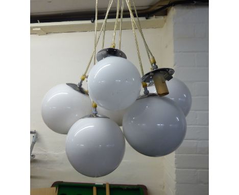 Interior lighting: to include a 1970s hanging centre light with seven white glass ball design shades  25" drop      BSR