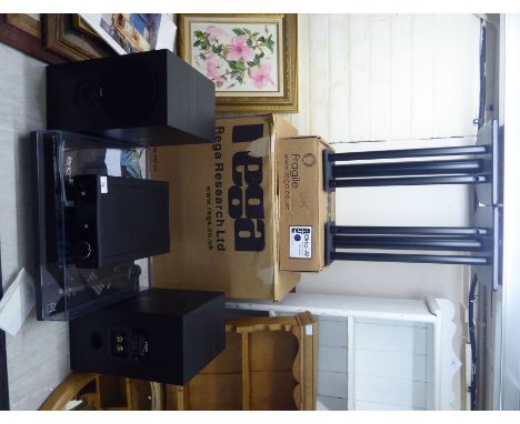 A Rega P1 turntable; a Brio-R model no.17129; and a pair of Rega black ash cased speakers, model no.027577  13.5''h with stan