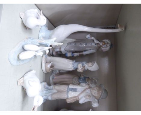 Ceramic ornaments: to include a Nao porcelain figure, a young boy with a sheep on his shoulders  7''h       OS10