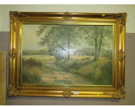 A LARGE GILT FRAMED PRINT