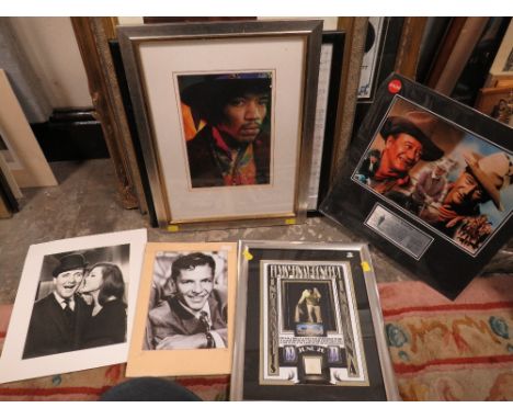 A LARGE QUANTITY OF FRAMED MEMORABILIA - CHARLIE CHAPLIN ,BUDDY HOLLY, ELVIS PRESLEY ETC (9)