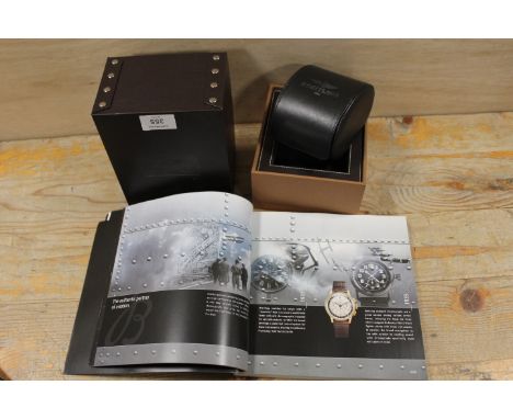 A BREITLING WATCH BOX TOGETHER WITH AN ASSOCIATED CATALOGUE 