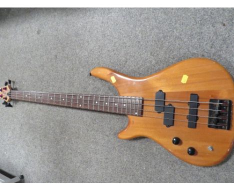 A STAGG LEFT HANDED BASS GUITAR 