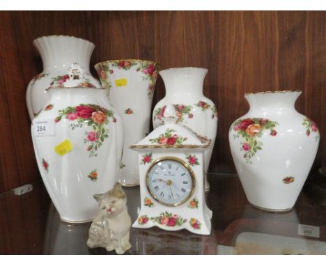 A SMALL COLLECTION OF ROYAL ALBERT OLD COUNTRY ROSES VASES, PLUS A CLOCK AND A ROYAL DOULTON MODEL OF A CAT 