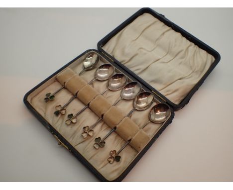 Hallmarked silver coffee spoons with enamel clover leaves  CONDITION REPORT: Enamel mainly absent 
