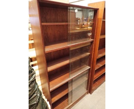 Large five shelf bookcase with sliding glass doors