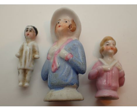 Victorian ceramic doll H: 4 cm and two pin cushion dolls 