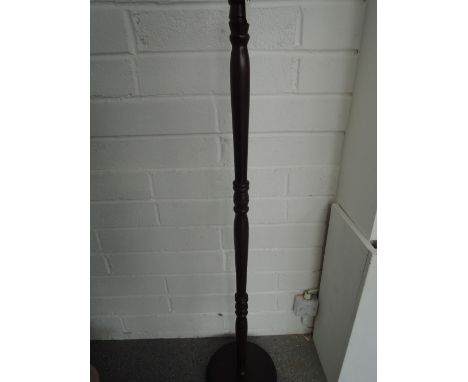 A mahogany floor lamp