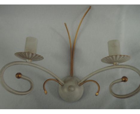 A pair of shabby chic gold and white wall light