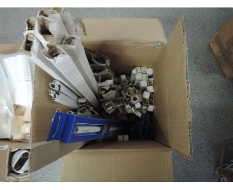 A box of various florescent light strips