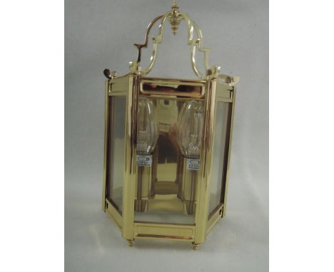 A coach lamp style wall light