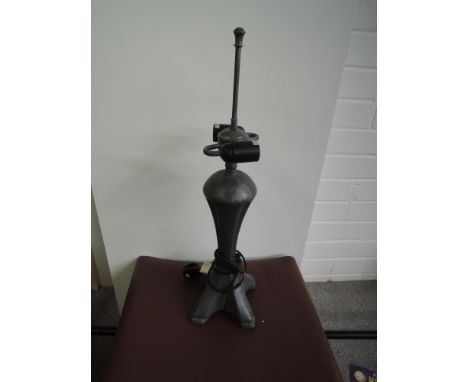 A cast iron effect table lamp