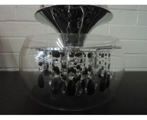 A light fitting with black and clear crystal droplets and stainless steel fitting