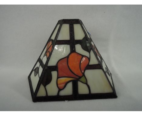 A Tiffany wall light shade