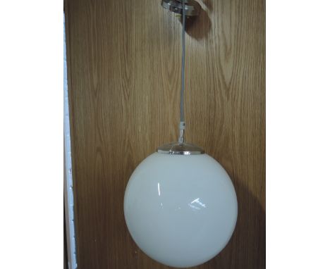 A ball pendant light fitting with satin silver suspencion
