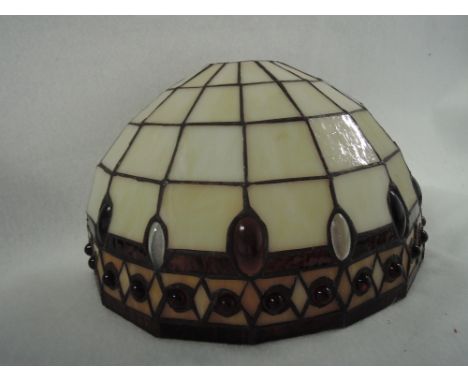 A Tiffany wall light shade