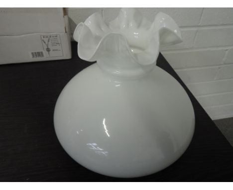A glass light shade (boxed)